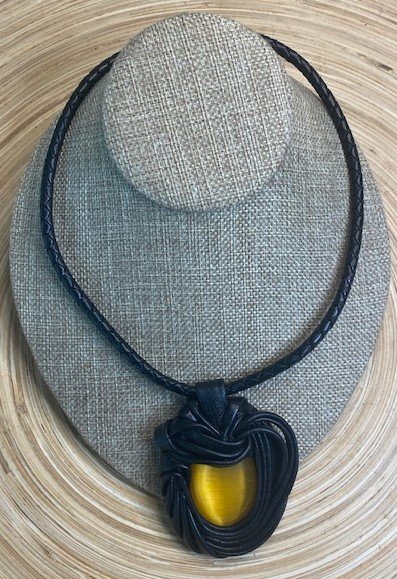 “Yellow Cat Eye” Leather Necklace and pendant.