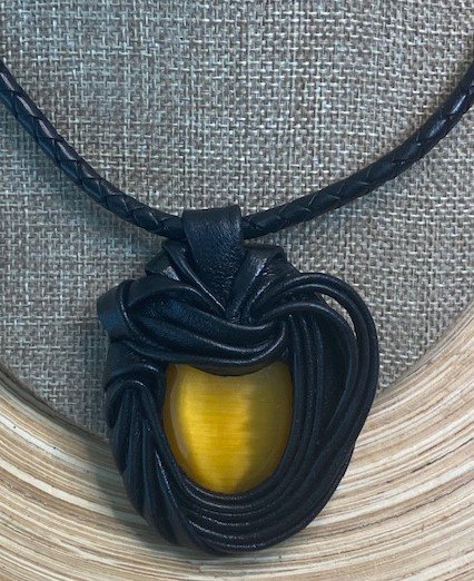 “Yellow Cat Eye” Leather Necklace and pendant.