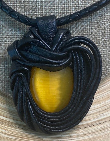 “Yellow Cat Eye” Leather Necklace and pendant.