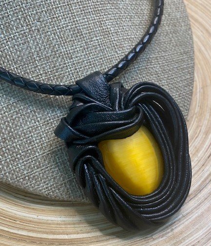 “Yellow Cat Eye” Leather Necklace and pendant.