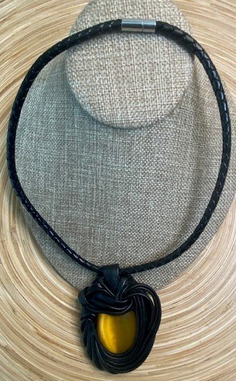 “Yellow Cat Eye” Leather Necklace and pendant.