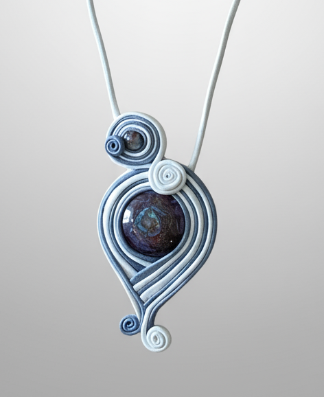 Necklace with a unique pendant on a gray background