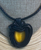 “Yellow Cat Eye” Leather Necklace and pendant.